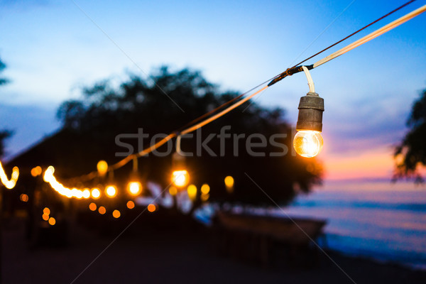 Plajă promenada noapte petrecere lumini apus Imagine de stoc © Kzenon