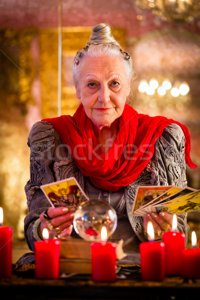 Tarot kártyák női ezoterikus jövő játszik Stock fotó © Kzenon