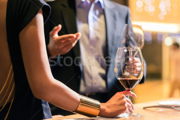 Asian couple drinking red wine Stock photo © Kzenon