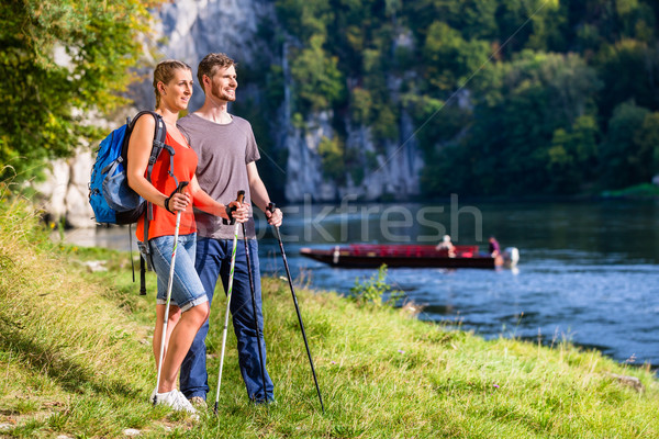 Stock photo: Man and woman hiking at Danube river in summer