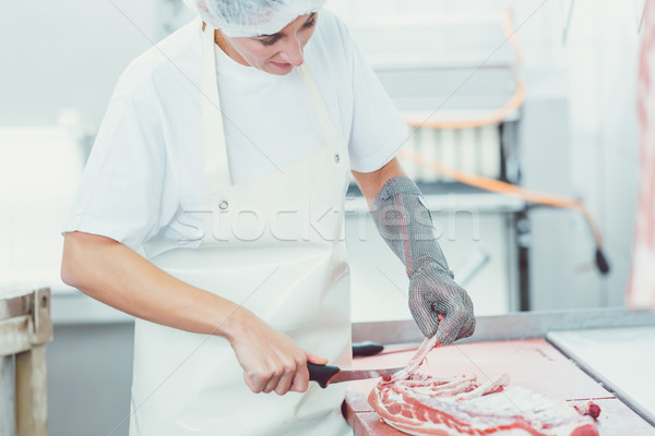 Meat cutting in butchery Stock photo © Kzenon