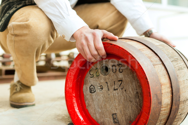 Brewer with beer barrel in brewery Stock photo © Kzenon