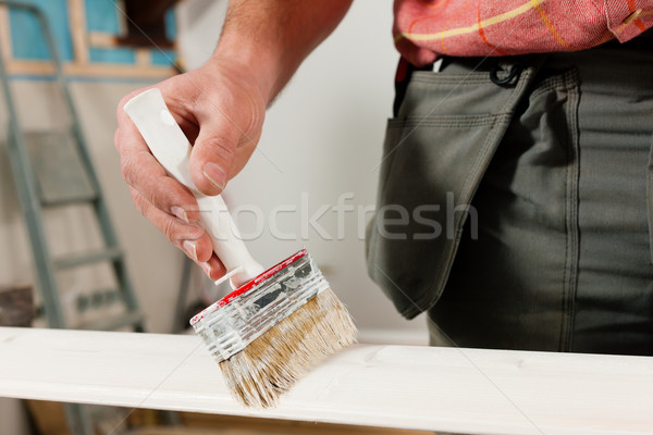 Stock photo: Man is painting