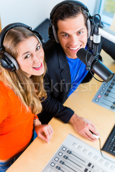 radio presenters in radio station on air Stock photo © Kzenon