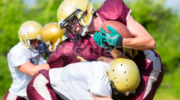 Attack at American Football Game being blocked Stock photo © Kzenon