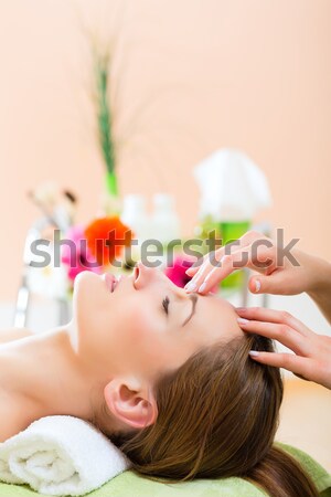 Woman enjoying a Ayurveda oil massage Stock photo © Kzenon
