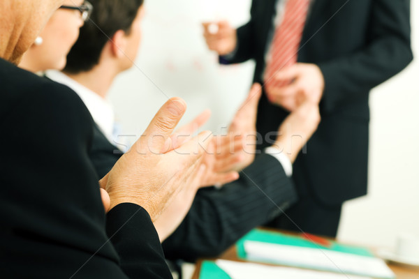 Business presentation: applause Stock photo © Kzenon