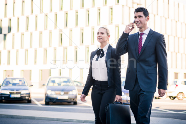 Business people in front of office building Stock photo © Kzenon
