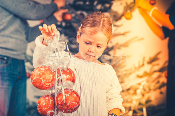 Child decorating the Christmas tree Stock photo © Kzenon