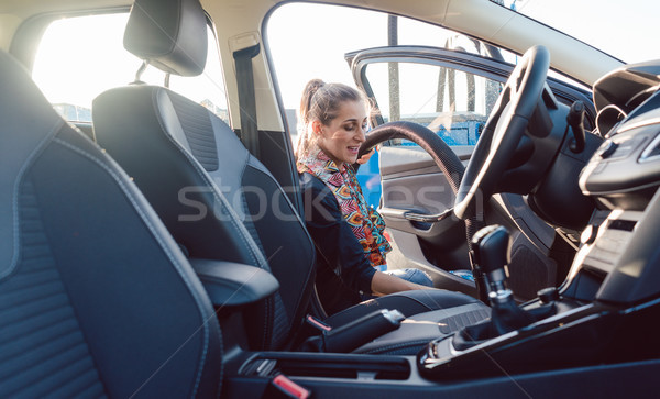 Woman cleaning inside of car Stock photo © Kzenon