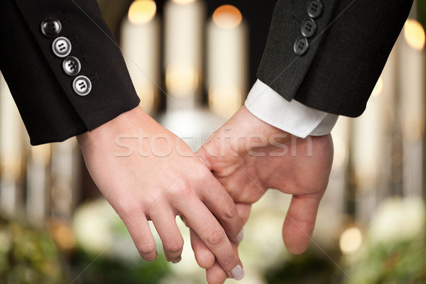 People at funeral consoling each other Stock photo © Kzenon