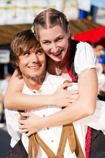 Couple in Tracht on Dult or Oktoberfest  Stock photo © Kzenon