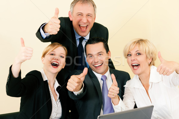 Stock photo: Businesspeople in office having great success