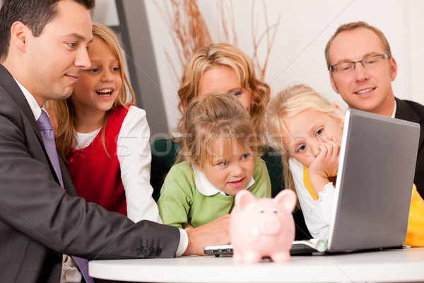 Stock photo: Family with consultant - finance and insurance