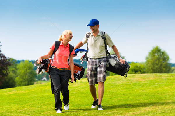 Stockfoto: Jonge · paar · spelen · golfbaan · golf · lopen