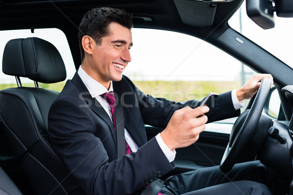 Stockfoto: Man · rijden · auto · telefoon · business