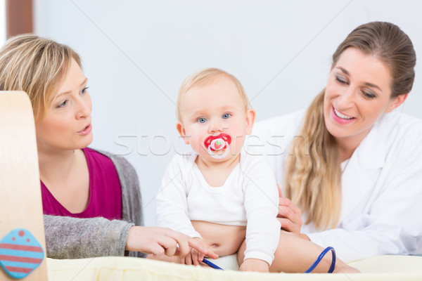 Portrait of a beautiful and healthy baby girl looking at camera  Stock photo © Kzenon