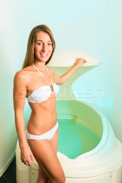 Wellness - young woman floating in Spa in bathtub Stock photo © Kzenon