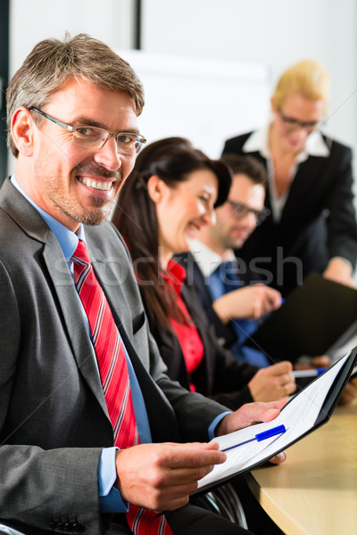 Business - businesspeople have team meeting Stock photo © Kzenon