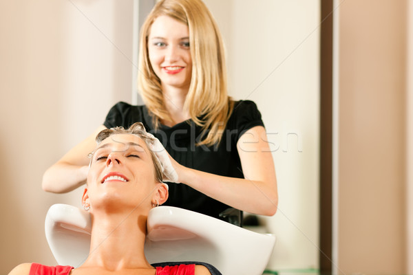 Woman at the hairdresser Stock photo © Kzenon