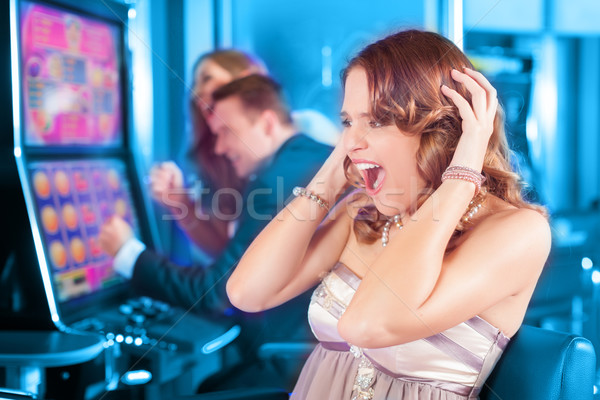 Znajomych hazardu kasyno kobieta człowiek Zdjęcia stock © Kzenon