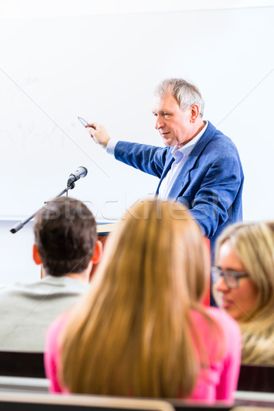 College professor giving lecture for students Stock photo © Kzenon