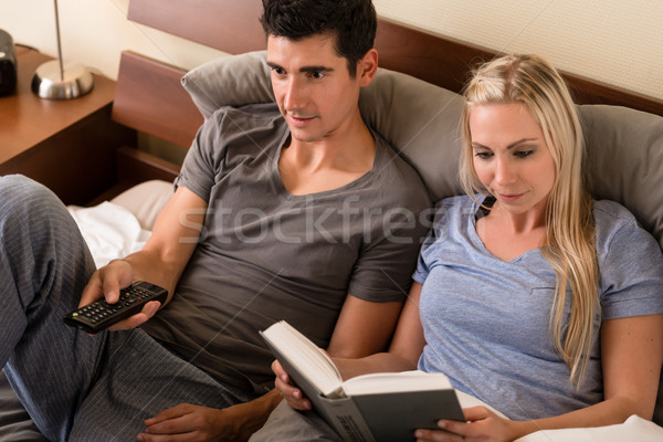 Young couple with different hobbies Stock photo © Kzenon