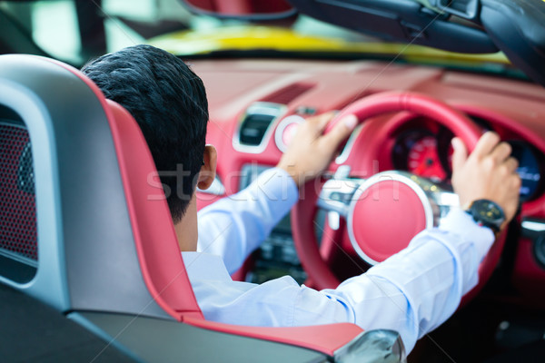 Asian man testing new sports car Stock photo © Kzenon