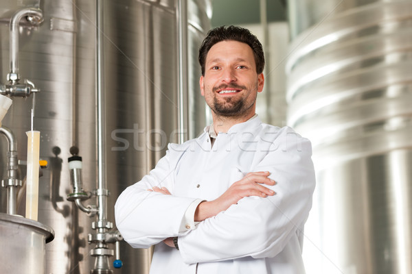 Beer brewer in his brewery Stock photo © Kzenon
