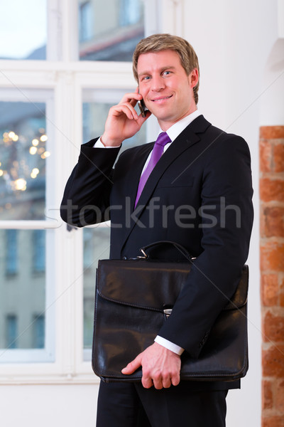 Laywer or Businessperson in Office on the phone Stock photo © Kzenon