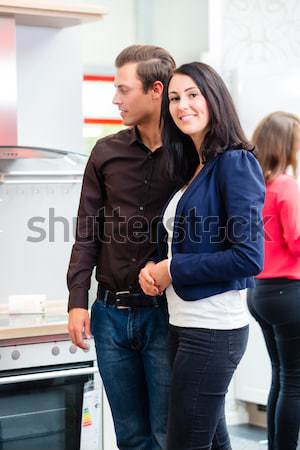 Couple buying domestic kitchen furniture store Stock photo © Kzenon