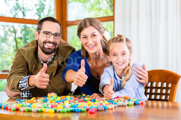 Family spending quality time playing together Stock photo © Kzenon
