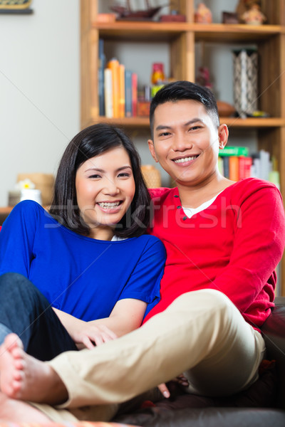 Asian couple on the sofa Stock photo © Kzenon