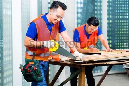 Worker, Dressmaker and CEO in a factory Stock photo © Kzenon