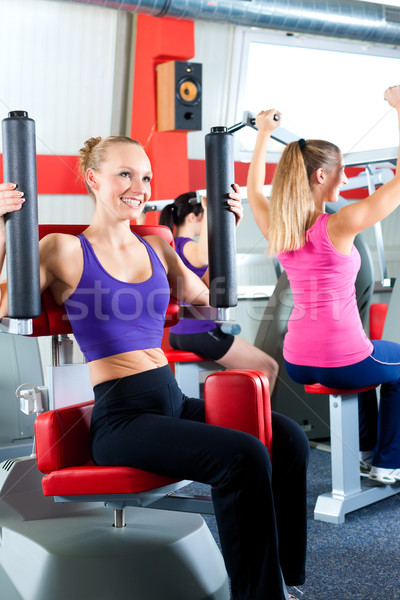 gym people doing strength or sports training  Stock photo © Kzenon