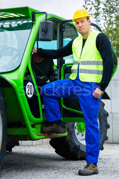 Constructor construcción maquinaria conductor pie Foto stock © Kzenon