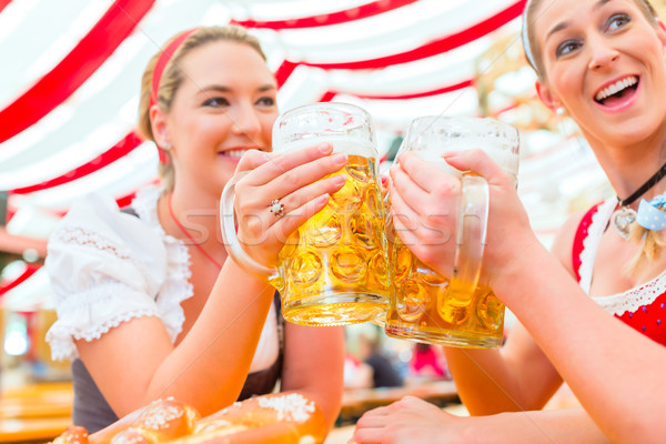 Stock photo: Friends drinking Bavarian beer at Oktoberfest 