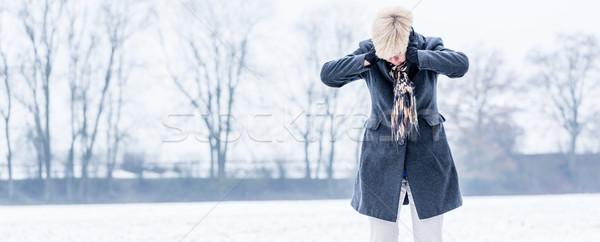 Senior woman with burnout in winter  Stock photo © Kzenon