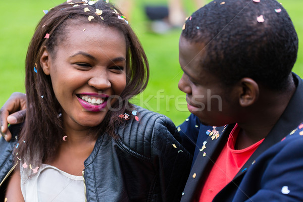 Black couple, woman and man, smiling at each other,  Stock photo © Kzenon