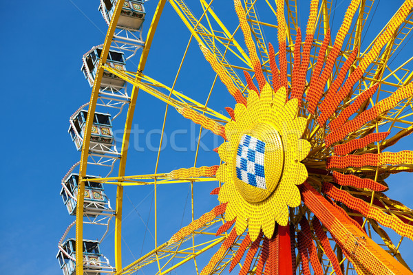 Big wheel in front of blue sky  Stock photo © Kzenon