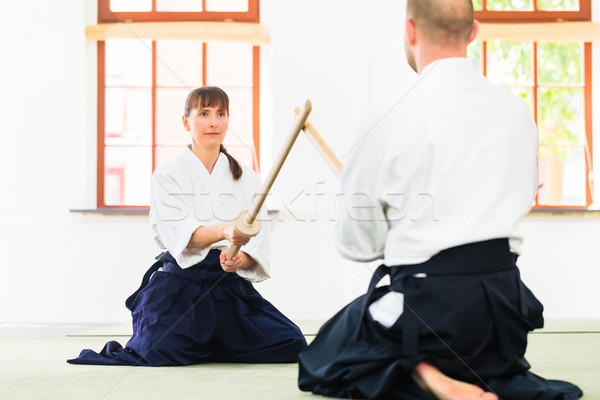 Mann Frau Aikido Schwert Kampf kämpfen Stock foto © Kzenon