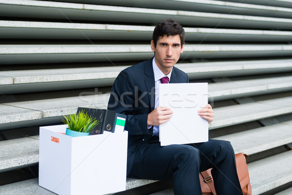 Młodych bezrobotny człowiek posiedzenia schody portret Zdjęcia stock © Kzenon