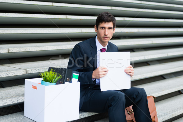 Jungen Arbeitslose Mann Sitzung Treppe Porträt Stock foto © Kzenon