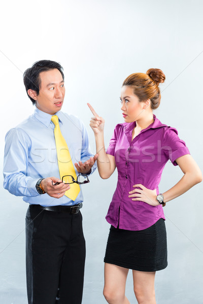 Crisis in Asian business office among colleagues Stock photo © Kzenon