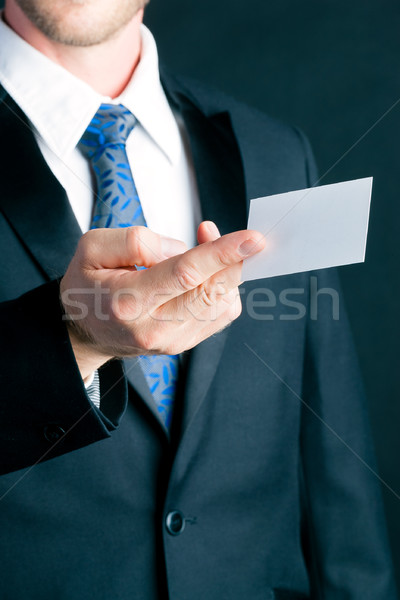 Businessman hand over business card Stock photo © Kzenon