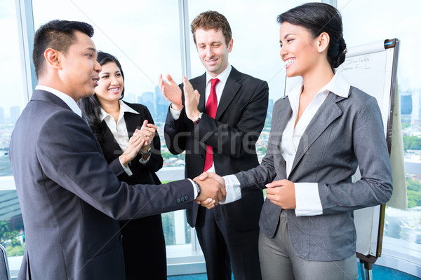 Business team applause in meeting Stock photo © Kzenon