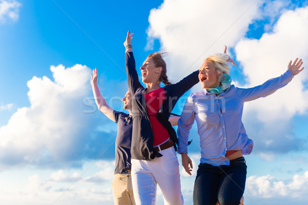 Friends take a walk at German north sea beach Stock photo © Kzenon