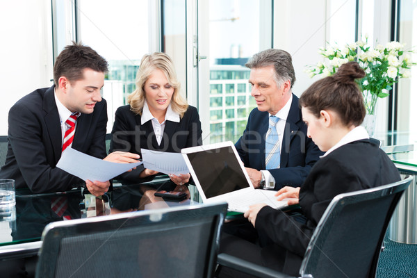 Stock photo: Business people - meeting in an office