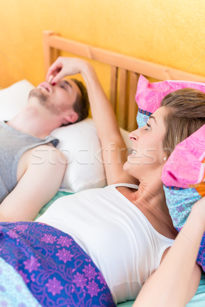 Nő mérges orr horkolás partner ágy Stock fotó © Kzenon