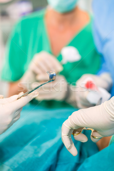 Stock photo: Surgeons operating in operation theater room